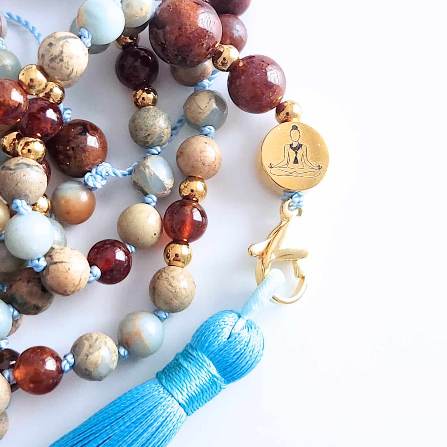 Mala en pierre naturelle de jaspe impérial et de grenat héssonite.