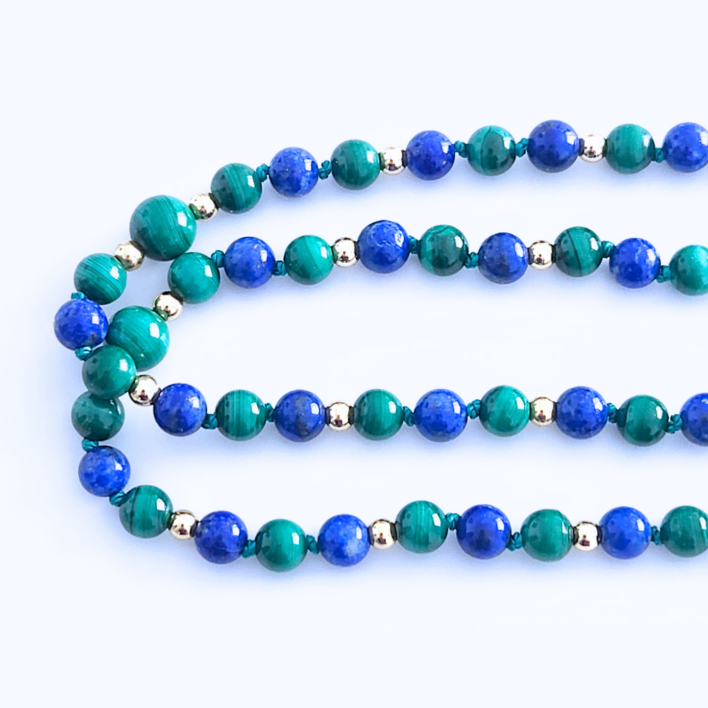 Mala en pierre naturelle de lapis-lazuli et malachite.