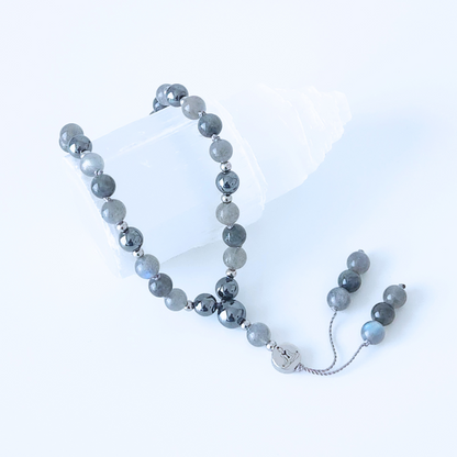 Mini mala de poche en pierre naturelle de labradorite et hématite noire.