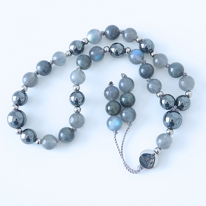 Mini mala de poche en pierre naturelle de labradorite et hématite noire.