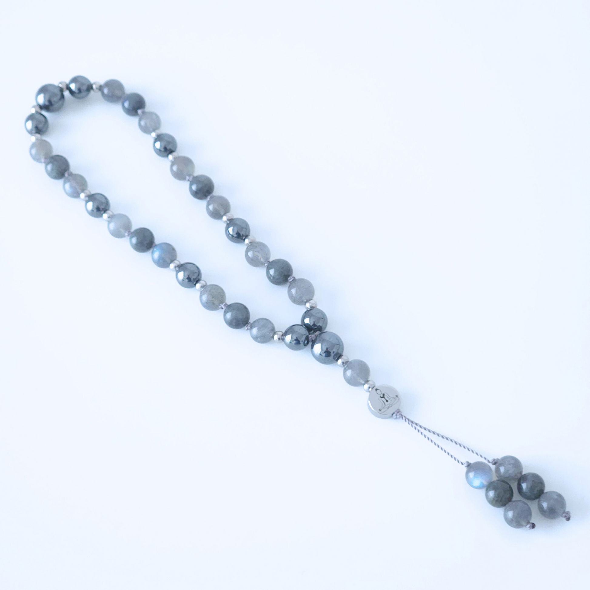 Mini mala de poche en pierre naturelle de labradorite et hématite noire.