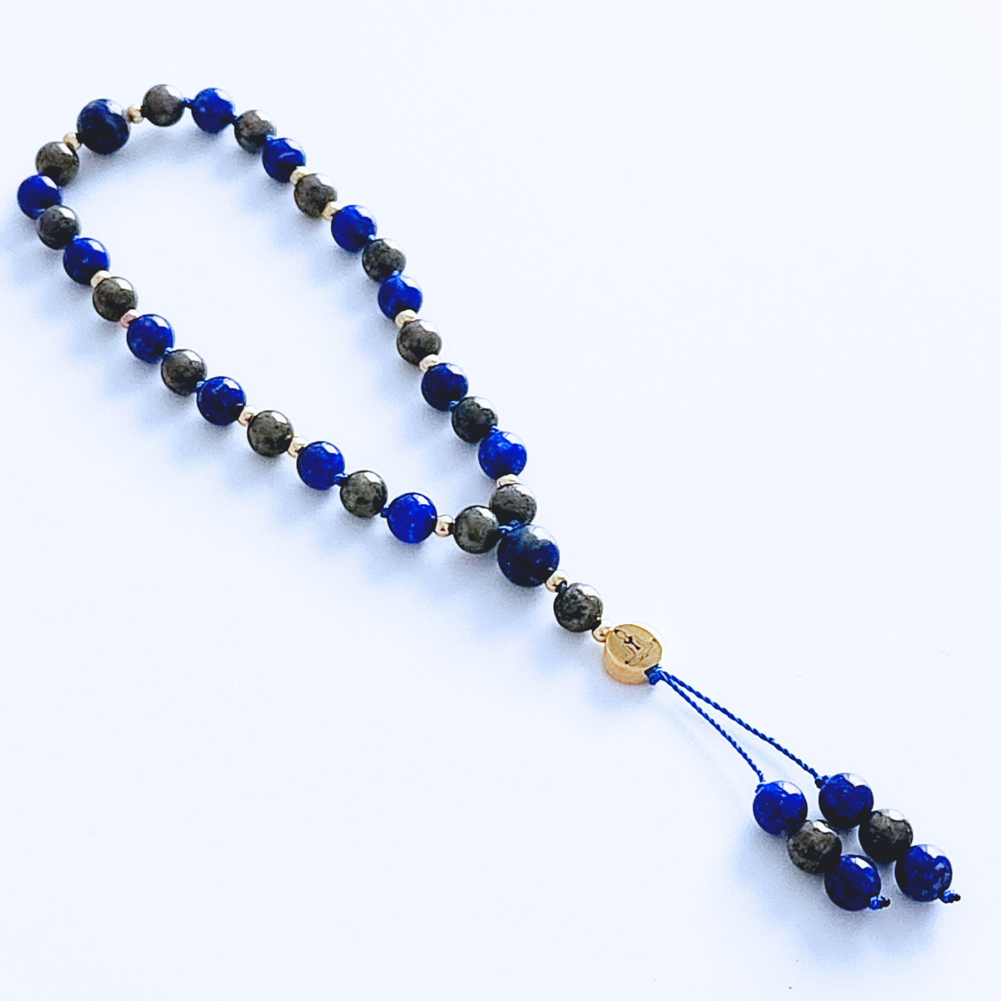 Mini mala de poche en pierre naturelle de lapis lazuli et pyrite.