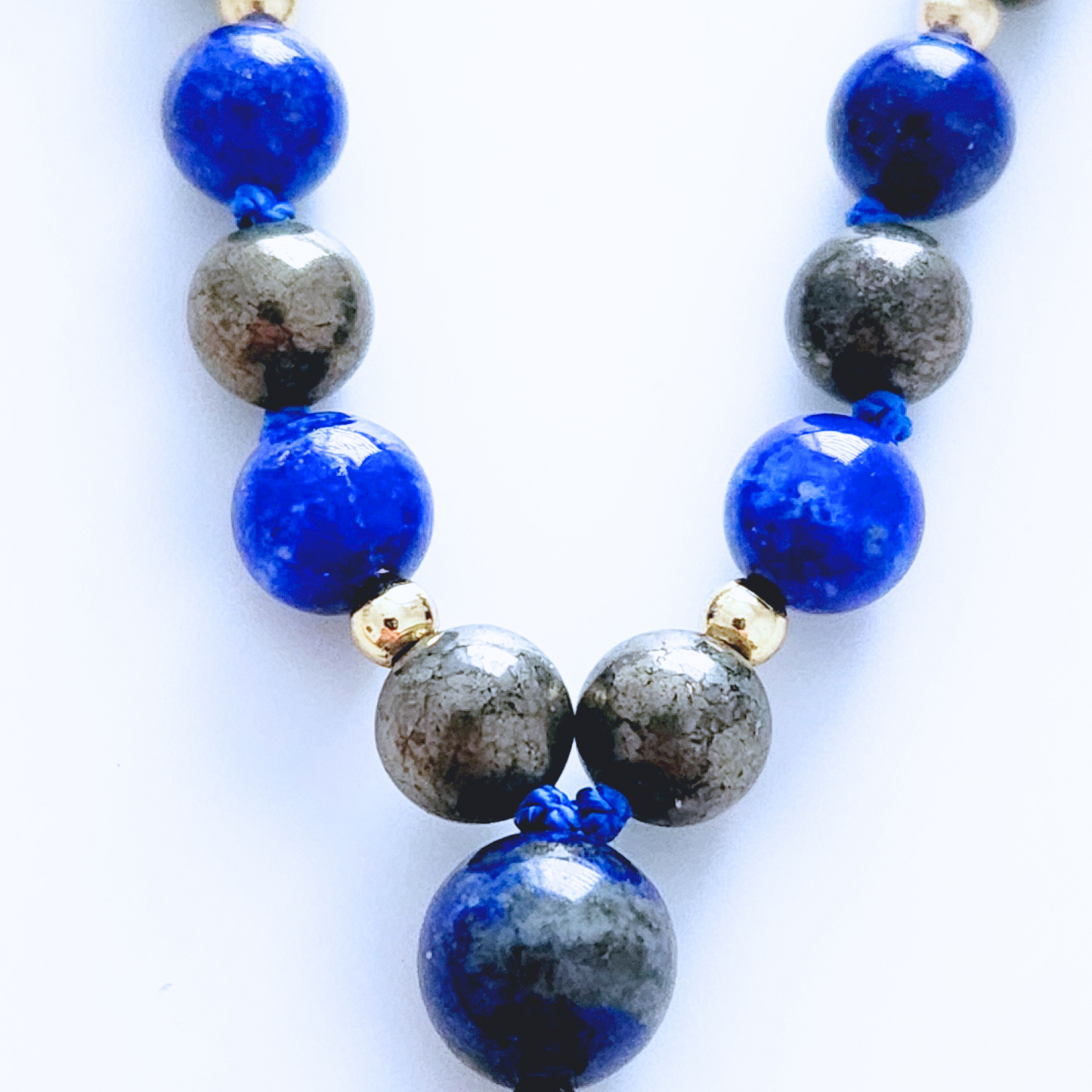 Mini mala de poche en pierre naturelle de lapis lazuli et pyrite.