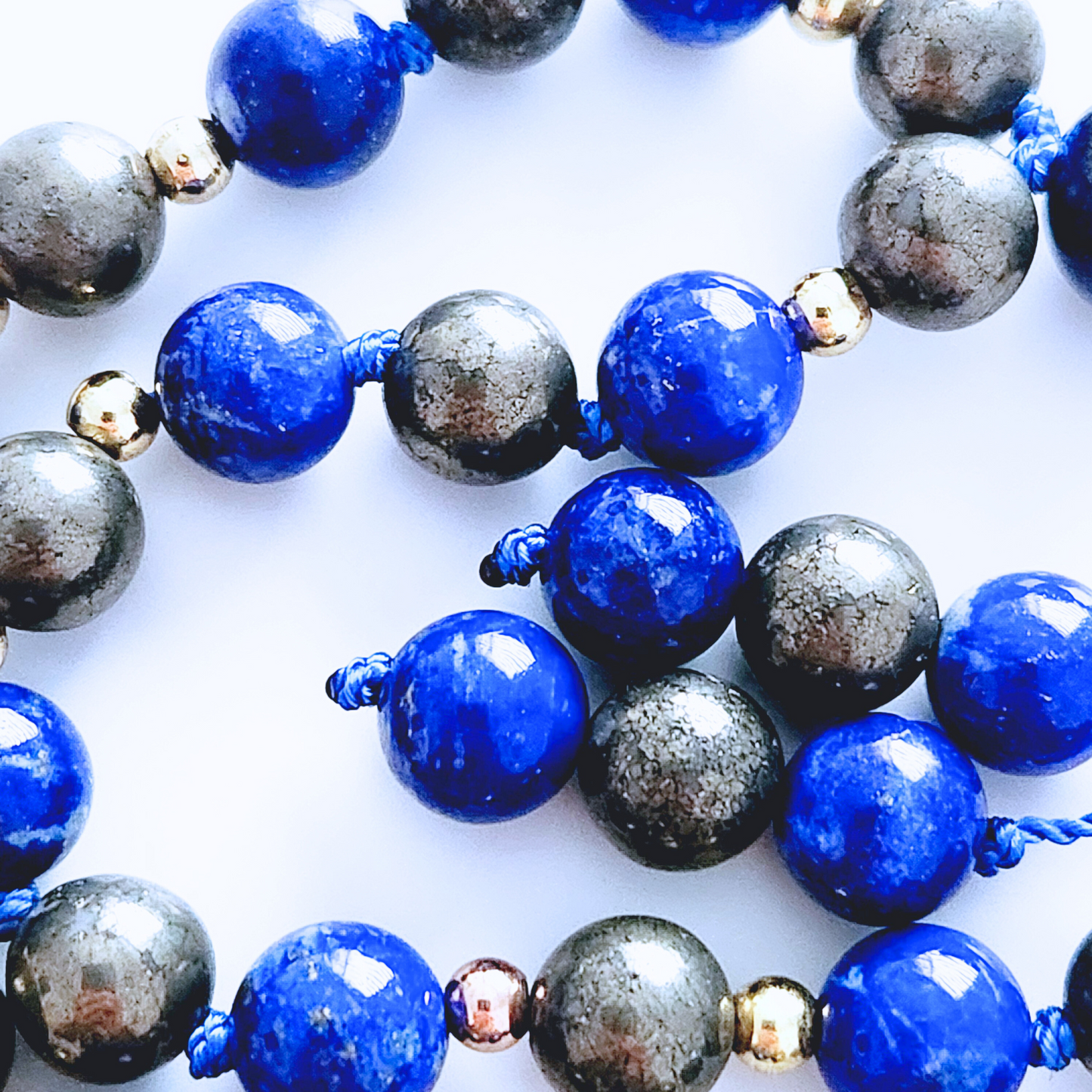 Mini mala de poche en pierre naturelle de lapis lazuli et pyrite.